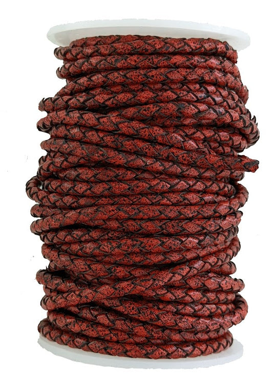 Autumn red and black fleck 4 mm round leather cord.